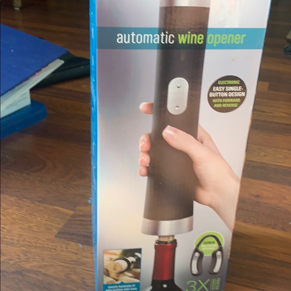 Auto wine opener. New never opened box